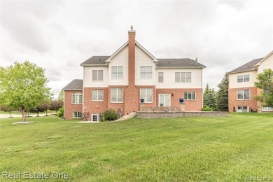 This stunning North-West facing colonial home, featuring 4 on The Inn At St. Johns Golf Course - Mark in Michigan - for sale on GolfHomes.com, golf home, golf lot