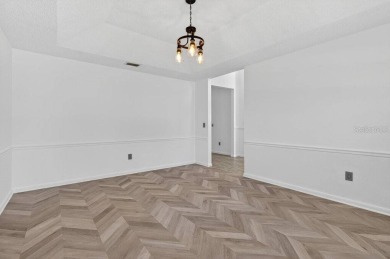 One or more photo(s) has been virtually staged. Welcome to your on The Grand Club - Pine Lakes Course in Florida - for sale on GolfHomes.com, golf home, golf lot