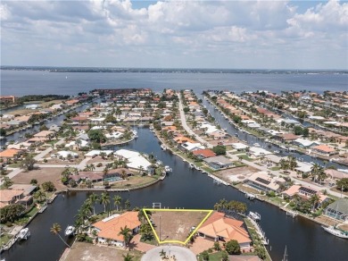 LARGER THAN AVERAGE KEY LOT IN PUNTA GORDA ISLES W/***162FT OF on Saint Andrews South Golf Club in Florida - for sale on GolfHomes.com, golf home, golf lot