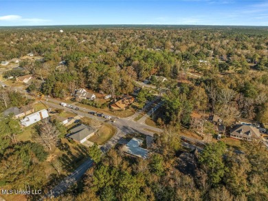 Resort-Style Living in Diamondhead, MS: Coastal Access and on Diamondhead Country Club in Mississippi - for sale on GolfHomes.com, golf home, golf lot