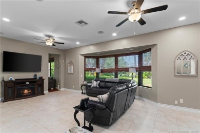 Welcome to your private oasis in Country Club Estates! Tucked on St. Lucie Trail Golf Club in Florida - for sale on GolfHomes.com, golf home, golf lot