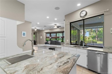 Welcome to your private oasis in Country Club Estates! Tucked on St. Lucie Trail Golf Club in Florida - for sale on GolfHomes.com, golf home, golf lot