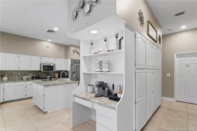 Welcome to your private oasis in Country Club Estates! Tucked on St. Lucie Trail Golf Club in Florida - for sale on GolfHomes.com, golf home, golf lot