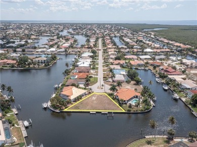 LARGER THAN AVERAGE KEY LOT IN PUNTA GORDA ISLES W/***162FT OF on Saint Andrews South Golf Club in Florida - for sale on GolfHomes.com, golf home, golf lot