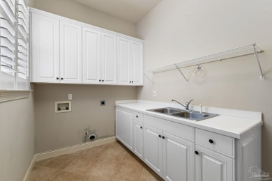 Experience luxury coastal living in this 4-bedroom, 4-bathroom on Kelly Plantation Golf Club in Florida - for sale on GolfHomes.com, golf home, golf lot