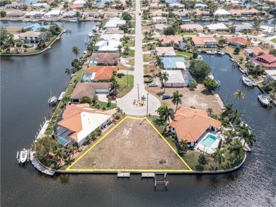 LARGER THAN AVERAGE KEY LOT IN PUNTA GORDA ISLES W/***162FT OF on Saint Andrews South Golf Club in Florida - for sale on GolfHomes.com, golf home, golf lot