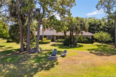 Welcome to your private oasis in Country Club Estates! Tucked on St. Lucie Trail Golf Club in Florida - for sale on GolfHomes.com, golf home, golf lot