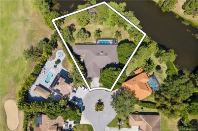 Welcome to your private oasis in Country Club Estates! Tucked on St. Lucie Trail Golf Club in Florida - for sale on GolfHomes.com, golf home, golf lot