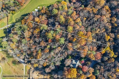 Nestled between the 5th green and the 6th tee, this 2.77-acre on Lake Toxaway Country Club in North Carolina - for sale on GolfHomes.com, golf home, golf lot