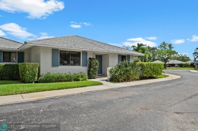 Welcome to this charming and updated 2-bedroom, 2-bathroom on PGA National Golf Club in Florida - for sale on GolfHomes.com, golf home, golf lot