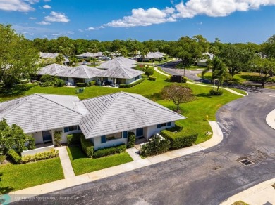 Welcome to this charming and updated 2-bedroom, 2-bathroom on PGA National Golf Club in Florida - for sale on GolfHomes.com, golf home, golf lot