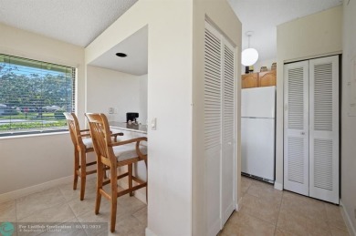 Welcome to this charming and updated 2-bedroom, 2-bathroom on PGA National Golf Club in Florida - for sale on GolfHomes.com, golf home, golf lot