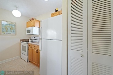 Welcome to this charming and updated 2-bedroom, 2-bathroom on PGA National Golf Club in Florida - for sale on GolfHomes.com, golf home, golf lot