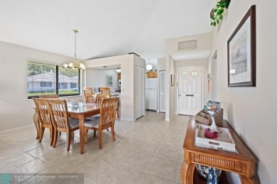 Welcome to this charming and updated 2-bedroom, 2-bathroom on PGA National Golf Club in Florida - for sale on GolfHomes.com, golf home, golf lot