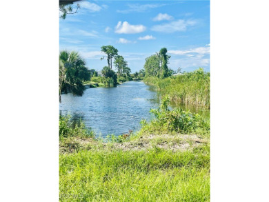 Build your dream home on this CORNER lot with FRESHWATER CANAL on Burnt Store Golf Club in Florida - for sale on GolfHomes.com, golf home, golf lot