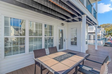 This beautiful 5 bedrooms and 4.5 baths raised beach house is in on Prestwick Country Club in South Carolina - for sale on GolfHomes.com, golf home, golf lot