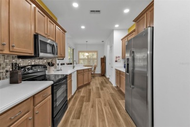 UPGRADED and UPDATED Bristol II floorplan with SUPER LARGE LANAI on Kings Gate Golf Club in Florida - for sale on GolfHomes.com, golf home, golf lot