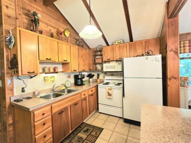 Welcome home to this wonderful 2 bedroom, 1 bath cabin in on Hide-A-Way Hills Golf Club in Ohio - for sale on GolfHomes.com, golf home, golf lot