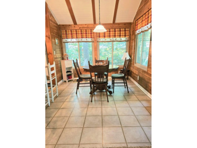 Welcome home to this wonderful 2 bedroom, 1 bath cabin in on Hide-A-Way Hills Golf Club in Ohio - for sale on GolfHomes.com, golf home, golf lot