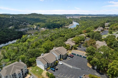 Discover lakeside luxury at its finest! This completely on Pointe Royale Village Country Club in Missouri - for sale on GolfHomes.com, golf home, golf lot