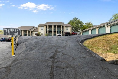 Discover lakeside luxury at its finest! This completely on Pointe Royale Village Country Club in Missouri - for sale on GolfHomes.com, golf home, golf lot