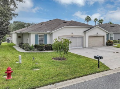 Affordable No exterior maintenance modern home in a highly on Arlington Ridge Golf Club in Florida - for sale on GolfHomes.com, golf home, golf lot