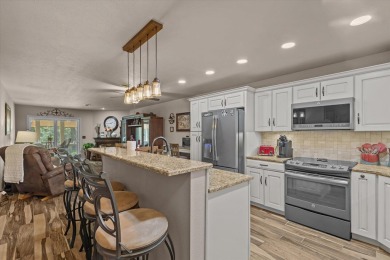 Discover lakeside luxury at its finest! This completely on Pointe Royale Village Country Club in Missouri - for sale on GolfHomes.com, golf home, golf lot