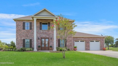 Showstopping two-story home on the pond in Squirrel Run! This on Squirrel Run Golf Courses in Louisiana - for sale on GolfHomes.com, golf home, golf lot