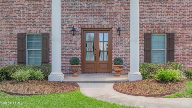 Showstopping two-story home on the pond in Squirrel Run! This on Squirrel Run Golf Courses in Louisiana - for sale on GolfHomes.com, golf home, golf lot
