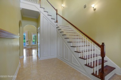 Showstopping two-story home on the pond in Squirrel Run! This on Squirrel Run Golf Courses in Louisiana - for sale on GolfHomes.com, golf home, golf lot