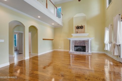 Showstopping two-story home on the pond in Squirrel Run! This on Squirrel Run Golf Courses in Louisiana - for sale on GolfHomes.com, golf home, golf lot