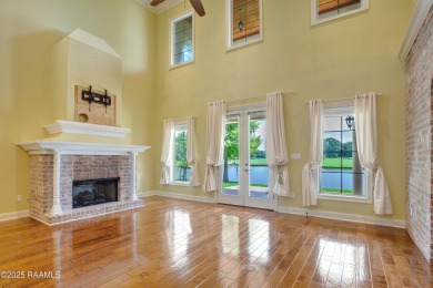 Showstopping two-story home on the pond in Squirrel Run! This on Squirrel Run Golf Courses in Louisiana - for sale on GolfHomes.com, golf home, golf lot