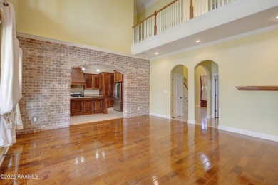 Showstopping two-story home on the pond in Squirrel Run! This on Squirrel Run Golf Courses in Louisiana - for sale on GolfHomes.com, golf home, golf lot