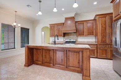 Showstopping two-story home on the pond in Squirrel Run! This on Squirrel Run Golf Courses in Louisiana - for sale on GolfHomes.com, golf home, golf lot