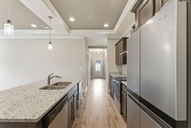 Built in 2023 and backing to the 10th green at Cherry Blossom on Cherry Blossom Golf and Country Club in Kentucky - for sale on GolfHomes.com, golf home, golf lot