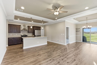 Built in 2023 and backing to the 10th green at Cherry Blossom on Cherry Blossom Golf and Country Club in Kentucky - for sale on GolfHomes.com, golf home, golf lot