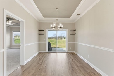 Built in 2023 and backing to the 10th green at Cherry Blossom on Cherry Blossom Golf and Country Club in Kentucky - for sale on GolfHomes.com, golf home, golf lot