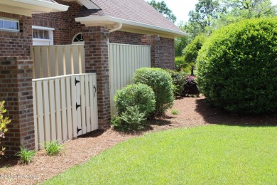 Welcome to your dream home! This custom-built residence is on Ocean Ridge Plantation in North Carolina - for sale on GolfHomes.com, golf home, golf lot