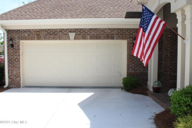 Welcome to your dream home! This custom-built residence is on Ocean Ridge Plantation in North Carolina - for sale on GolfHomes.com, golf home, golf lot