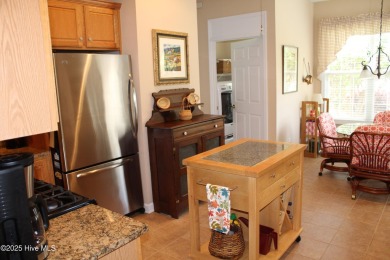 Welcome to your dream home! This custom-built residence is on Ocean Ridge Plantation in North Carolina - for sale on GolfHomes.com, golf home, golf lot