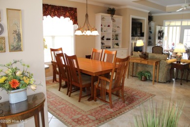 Welcome to your dream home! This custom-built residence is on Ocean Ridge Plantation in North Carolina - for sale on GolfHomes.com, golf home, golf lot