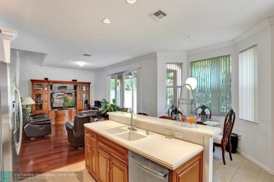 Lowest price, very well maintained 4 bed 2.5 bath in the highly on The Links At Madison Green in Florida - for sale on GolfHomes.com, golf home, golf lot