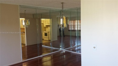 Experience vibrant 55+ living in this charming second floor on Flamingo Lakes Country Club in Florida - for sale on GolfHomes.com, golf home, golf lot