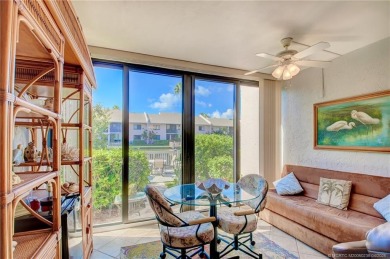 This first-floor, corner condo in Beachtree I within Ocean on Ocean Village Golf Course in Florida - for sale on GolfHomes.com, golf home, golf lot