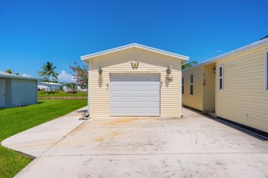 LAND OWNED ON THE WATER. OVERSIZED GARAGE. HURRICANE IMPACT on Savanna Golf Club in Florida - for sale on GolfHomes.com, golf home, golf lot