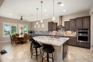 Golf Course Endeavor with Cart Garage! Travertine steps lead to on Copper Canyon Golf Club in Arizona - for sale on GolfHomes.com, golf home, golf lot