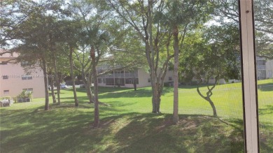 Experience vibrant 55+ living in this charming second floor on Flamingo Lakes Country Club in Florida - for sale on GolfHomes.com, golf home, golf lot