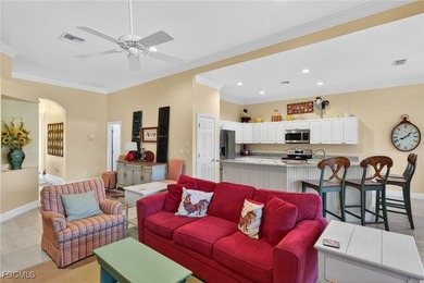 Enjoy peaceful lakefront living in this popular Heron model on Crown Colony Golf and Country Club in Florida - for sale on GolfHomes.com, golf home, golf lot