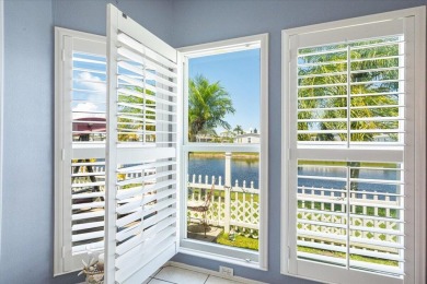 LAND OWNED ON THE WATER. OVERSIZED GARAGE. HURRICANE IMPACT on Savanna Golf Club in Florida - for sale on GolfHomes.com, golf home, golf lot