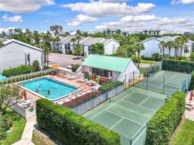 This first-floor, corner condo in Beachtree I within Ocean on Ocean Village Golf Course in Florida - for sale on GolfHomes.com, golf home, golf lot